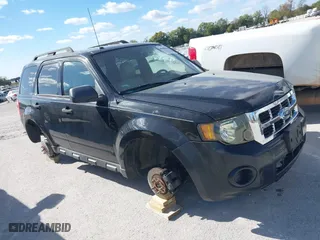 2010 Ford Escape XLT with VIN 1FMCU9D74AKC23611, listed as a IAAI auction lot 40600485 with 171,152 mi miles. Bid and sale history available at carsss.com. Image 1.