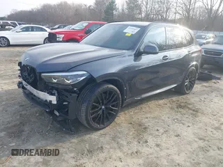 2020 BMW X5 sDrive40i with VIN 5UXCR4C06LLW64438, listed as a IAAI auction lot 41520407 with 89,868 mi miles and . Bid and sale history available at DreamBid. Image 18.