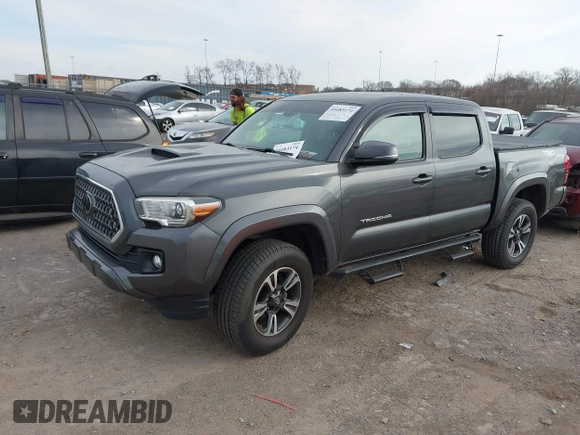 2018 Toyota Tacoma SR with VIN 3TMCZ5AN0JM150540, listed as a IAAI auction lot 41683174 with 78,553 mi miles and . Bid and sale history available at DreamBid. Image 2.