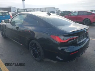2021 BMW 4 Series M440i xDrive with VIN WBA13AR05MCG58597, listed as a IAAI auction lot 41475262 with 42,626 mi miles and . Bid and sale history available at DreamBid. Image 3.