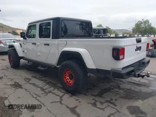 2021 Jeep Gladiator Willys with VIN 1C6HJTAG1ML572638, listed as a IAAI auction lot 42065562 with 43,040 mi miles and . Bid and sale history available at DreamBid. Image 3.