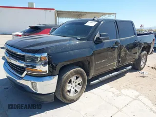 2018 Chevrolet Silverado 1500 LT with VIN 3GCPCREC9JG569925, listed as a IAAI auction lot 42086625 with 184,594 mi miles and . Bid and sale history available at DreamBid. Image 17.