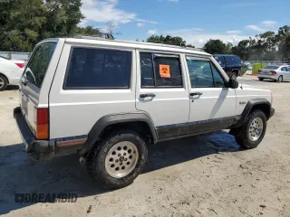 1996 Jeep Cherokee Sport with VIN 1J4FT68S4TL131956, listed as a Copart auction lot 74568064 with 174,014 mi miles and Non Repairable. Bid and sale history available at carsss.com. Image 3.