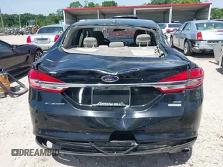 2017 Ford Fusion SE z VIN 3FA6P0HDXHR198388, wystawiony jako IAAI lot #42231069 z przebiegiem 143 709 mil mil oraz . Historia ofert i sprzedaży dostępna na DreamBid. Obrazek 15.