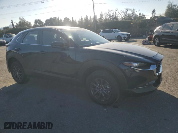 2025 Mazda CX-30 S with VIN 3MVDMBAM5SM751984, listed as a Copart auction lot 43232255 with 2,448 mi miles and Salvage title. Bid and sale history available at DreamBid. Image 4.