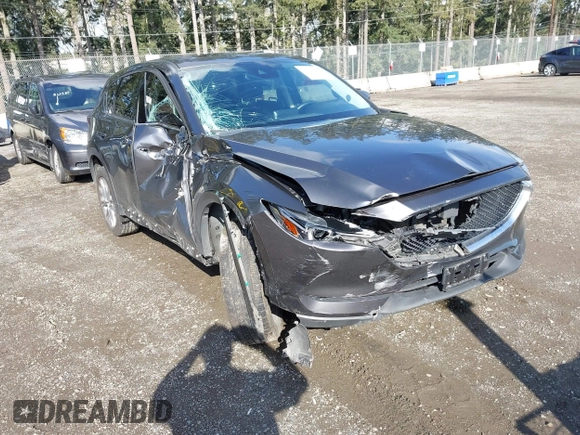 2019 Mazda CX-5 Grand Touring with VIN JM3KFBDM3K1677208, listed as a IAAI auction lot 41929299 with 58,163 mi miles. Bid and sale history available at carsss.com. Image 6.
