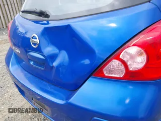 2009 Nissan Versa 1.8 S with VIN 3N1BC13E79L425943, listed as a IAAI auction lot 42198557 with 217,059 mi miles. Bid and sale history available at carsss.com. Image 6.