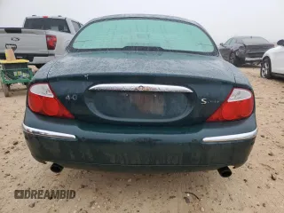 2002 Jaguar S-Type with VIN SAJDA01P12GM27242, listed as a Copart auction lot 88579215 with 218,546 mi miles and Salvage Title. Bid and sale history available at DreamBid. Image 6.