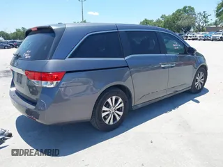 2014 Honda Odyssey EX-L z VIN 5FNRL5H69EB095297, wystawiony jako IAAI lot #42299438 z przebiegiem 126 841 mil mil oraz . Historia ofert i sprzedaży dostępna na DreamBid. Obrazek 4.