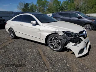 2014 Mercedes-Benz E 350 with VIN WDDKJ5KB3EF228182, listed as a Copart auction lot 54079535 with 143,481 mi miles and Salvage Title. Bid and sale history available at DreamBid. Image 4.