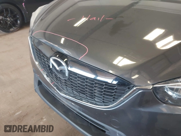 2014 Mazda CX-5 Sport with VIN JM3KE4BE5E0375360, listed as a IAAI auction lot 41788977 with 135,487 mi miles. Bid and sale history available at carsss.com. Image 17.