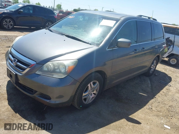 2007 Honda Odyssey EX-L z VIN 5FNRL38797B137595, wystawiony jako IAAI lot #42002233 z przebiegiem 192 296 mil mil oraz . Historia ofert i sprzedaży dostępna na DreamBid. Obrazek 17.