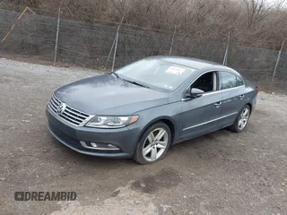 2013 Volkswagen CC Sport with VIN WVWBP7AN8DE513898, listed as a IAAI auction lot 41694857 with 67,440 mi miles. Bid and sale history available at carsss.com. Image 2.