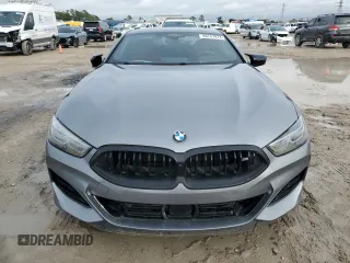 2024 BMW 8 Series M850i xDrive z VIN WBABC4C0XRCN56084, wystawiony jako Copart lot #86747974 z przebiegiem Nie podano mil oraz Szkody całkowita. Historia ofert i sprzedaży dostępna na DreamBid. Obrazek 5.