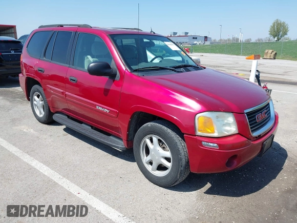 2005 GMC Envoy SLT with VIN 1GKDS13SX52144959, listed as a IAAI auction lot 41968495 with 238,199 mi miles. Bid and sale history available at carsss.com. Image 1.