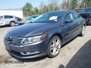 2014 Volkswagen CC Lux with VIN WVWRP7AN7EE501483, listed as a IAAI auction lot 42090985 with 121,737 mi miles. Bid and sale history available at carsss.com. Image 2.
