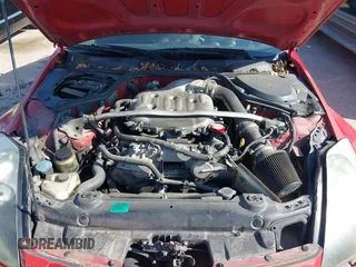 2004 Nissan 350Z Enthusiast with VIN JN1AZ34D44M102606, listed as a IAAI auction lot 41123390 with 174,603 mi miles and . Bid and sale history available at DreamBid. Image 10.