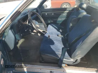 1987 Chevrolet El Camino z VIN 3GCCW80Z9HS905561, wystawiony jako Copart lot #75401604 z przebiegiem 32 958 mil mil oraz Szkody całkowita. Historia ofert i sprzedaży dostępna na DreamBid. Obrazek 7.
