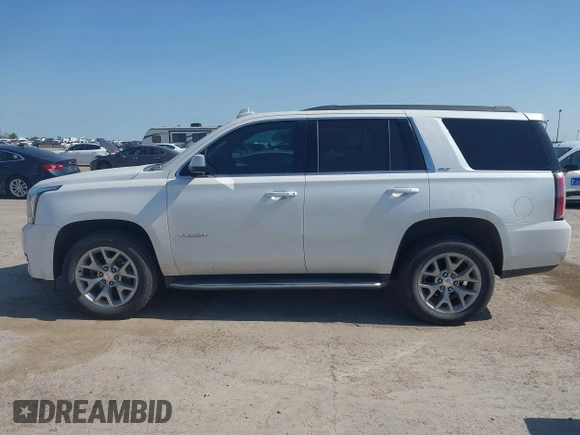 2017 GMC Yukon SLT z VIN 1GKS1BKC2HR378437, wystawiony jako IAAI lot #41923260 z przebiegiem 127 356 mil mil oraz . Historia ofert i sprzedaży dostępna na DreamBid. Obrazek 14.
