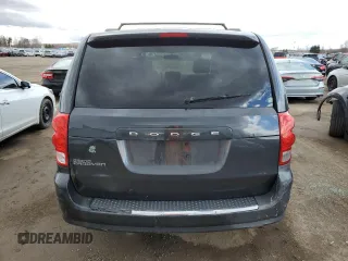 2012 Dodge Grand Caravan SE with VIN 2C4RDGBG5CR397651, listed as a Copart auction lot 52878905 with 248,103 mi miles and Clean Title. Bid and sale history available at DreamBid. Image 6.