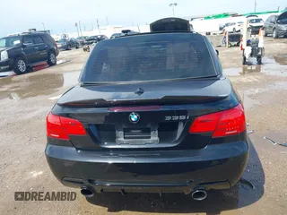 2013 BMW 3 Series 335i with VIN WBADX7C52DJ589384, listed as a IAAI auction lot 42453370 with 58,821 mi miles and . Bid and sale history available at DreamBid. Image 16.
