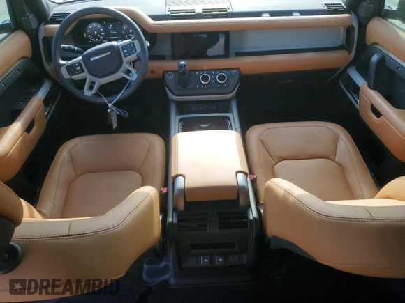 2024 Land Rover Defender S with VIN SALEJ7EU2R2272955, listed as a Copart auction lot 66796994 with 9,079 mi miles and Salvage title. Bid and sale history available at DreamBid. Image 8.