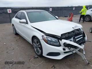 2018 Mercedes-Benz C with VIN 55SWF4JB1JU237940, listed as a IAAI auction lot 41911087 with 57,362 mi miles. Bid and sale history available at carsss.com. Image 1.