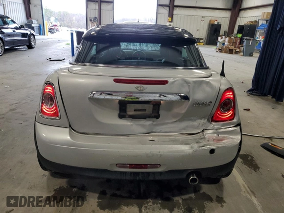 2013 MINI Cooper Coupe with VIN WMWSX1C50DT507354, listed as a Copart auction lot 48070765 with 98,830 mi miles and Salvage Title. Bid and sale history available at carsss.com. Image 6.