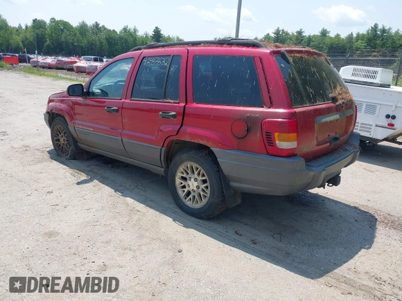 2001 Jeep Grand Cherokee Laredo z VIN 1J4GW48S11C720055, wystawiony jako IAAI lot #42453532 z przebiegiem 158 486 mil mil oraz . Historia ofert i sprzedaży dostępna na DreamBid. Obrazek 3.