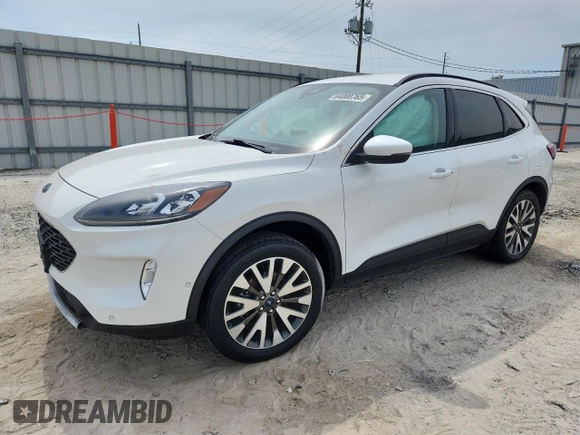2020 Ford Escape Titanium z VIN 1FMCU9J91LUB53076, wystawiony jako Copart lot #64008765 z przebiegiem Nie podano mil oraz Nie do naprawy • Non repairable. Historia ofert i sprzedaży dostępna na DreamBid. Obrazek 1.