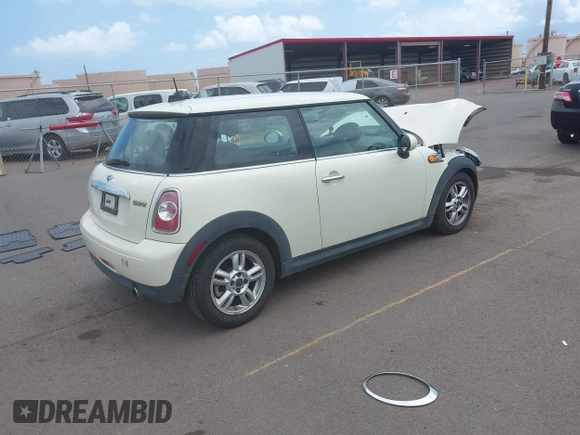 2012 MINI Hardtop with VIN WMWSU3C54CT262450, listed as a IAAI auction lot 42148430 with 55,250 mi miles and . Bid and sale history available at DreamBid. Image 4.