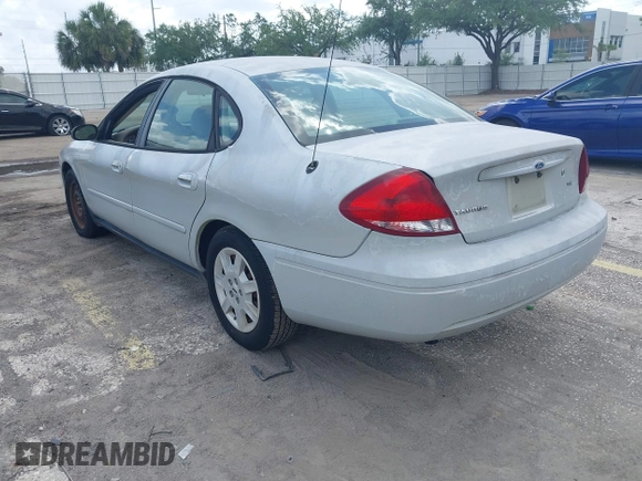 2006 Ford Taurus SE with VIN 1FAFP53U56A209213, listed as a IAAI auction lot 42009423 with 118,083 mi miles. Bid and sale history available at carsss.com. Image 3.