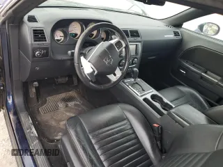 2013 Dodge Challenger R/T z VIN 2C3CDYBT9DH585965, wystawiony jako Copart lot #52995875 z przebiegiem 131 456 mil mil oraz Szkoda całkowita • Salvage title. Historia ofert i sprzedaży dostępna na DreamBid. Obrazek 8.