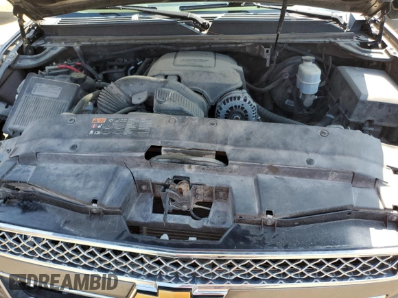 2013 Chevrolet Suburban LT with VIN 1GNSCJE07DR104489, listed as a Copart auction lot 60844784 with 185,420 mi miles and Salvage Title. Bid and sale history available at carsss.com. Image 12.