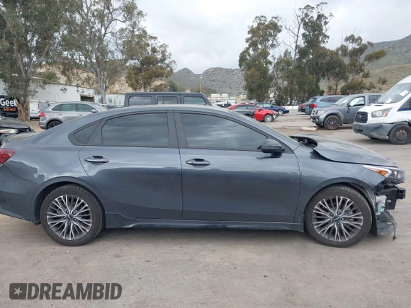 2023 Kia Forte GT-Line z VIN 3KPF54ADXPE598362, wystawiony jako IAAI lot #41857738 z przebiegiem 64 208 mil mil oraz . Historia ofert i sprzedaży dostępna na DreamBid. Obrazek 12.