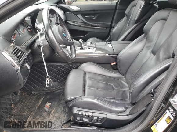 2015 BMW M6 z VIN WBS6C9C59FD467652, wystawiony jako Copart lot #66093293 z przebiegiem Nie podano mil oraz . Historia ofert i sprzedaży dostępna na DreamBid. Obrazek 7.
