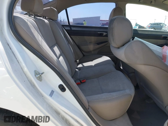 2010 Honda Civic LX with VIN 2HGFA1F50AH530242, listed as a IAAI auction lot 42218948 with 222,841 mi miles and . Bid and sale history available at DreamBid. Image 8.