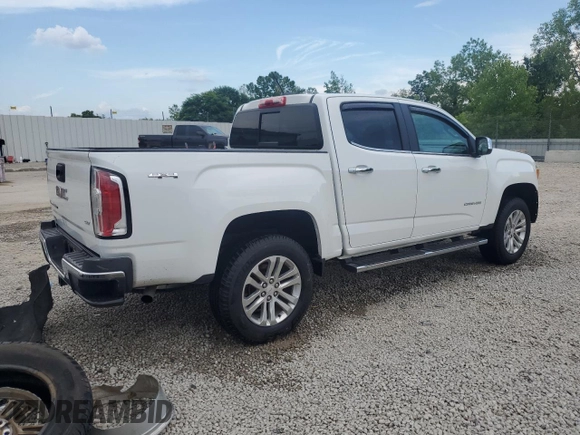 2019 GMC Canyon 4WD SLT with VIN 1GTG6DEN8K1274729, listed as a Copart auction lot 60804575 with 107,382 mi miles and Salvage title. Bid and sale history available at DreamBid. Image 3.