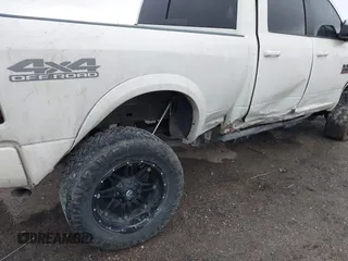 2017 Ram 2500 Laramie z VIN 3C6UR5FL7HG749723, wystawiony jako IAAI lot #41523969 z przebiegiem 133 622 mil mil oraz . Historia ofert i sprzedaży dostępna na DreamBid. Obrazek 6.