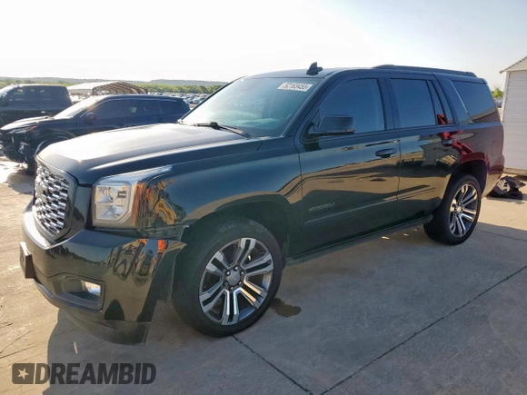 2020 GMC Yukon Denali with VIN 1GKS2CKJ4LR144035, listed as a Copart auction lot 52163455 with 67,944 mi miles and Salvage Title. Bid and sale history available at carsss.com. Image 1.