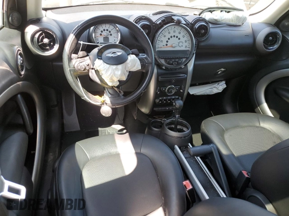 2012 MINI Countryman with VIN WMWZB3C58CWM02843, listed as a Copart auction lot 52131715 with Not Provided miles and Salvage Title. Bid and sale history available at DreamBid. Image 8.