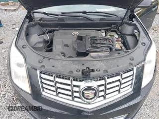 2015 Cadillac SRX z VIN 3GYFNAE30FS515953, wystawiony jako IAAI lot #40562508 z przebiegiem 163 112 mil mil oraz . Historia ofert i sprzedaży dostępna na DreamBid. Obrazek 10.