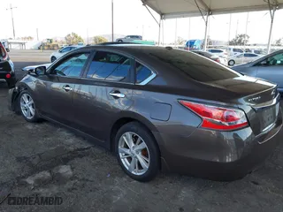 2015 Nissan Altima 2.5 SV with VIN 1N4AL3AP1FC169188, listed as a IAAI auction lot 41274644 with 82,222 mi miles. Bid and sale history available at carsss.com. Image 3.