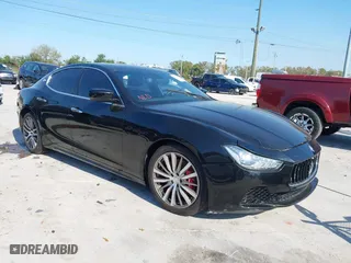 2015 Maserati Ghibli with VIN ZAM57XSA1F1133056, listed as a IAAI auction lot 41719670 with 1 mi miles. Bid and sale history available at carsss.com. Image 1.