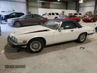 1989 Jaguar XJS z VIN SAJNV4847KC164497, wystawiony jako Copart lot #87258504 z przebiegiem 90 299 mil mil oraz Szkody całkowita. Historia ofert i sprzedaży dostępna na DreamBid. Obrazek 1.