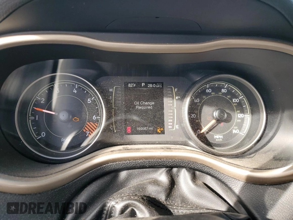 2015 Jeep Cherokee Latitude with VIN 1C4PJLCBXFW700186, listed as a Copart auction lot 49210955 with 160,087 mi miles and Salvage Title. Bid and sale history available at DreamBid. Image 9.