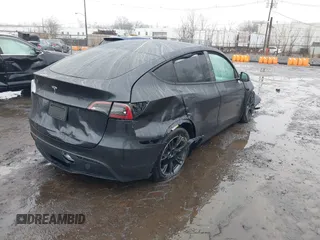 2025 Tesla Model Y Long Range with VIN 7SAYGDED6SF226035, listed as a IAAI auction lot 41102115 with Not Provided miles and . Bid and sale history available at DreamBid. Image 4.