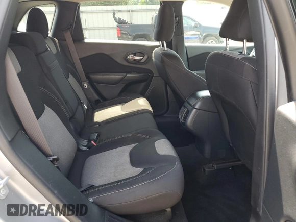 2015 Jeep Cherokee Sport z VIN 1C4PJLAB4FW707010, wystawiony jako Copart lot #57338145 z przebiegiem 112 720 mil mil oraz Czysty tytuł • Clean title. Historia ofert i sprzedaży dostępna na DreamBid. Obrazek 11.