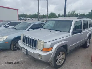 2010 Jeep Commander Sport with VIN 1J4RH4GK8AC157462, listed as a IAAI auction lot 41997158 with 149,935 mi miles. Bid and sale history available at carsss.com. Image 2.