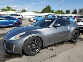 2015 Nissan 370Z with VIN JN1AZ4EH2FM444159, listed as a Copart auction lot 71005944 with 54,063 mi miles and Salvage Title. Bid and sale history available at carsss.com. Image 1.